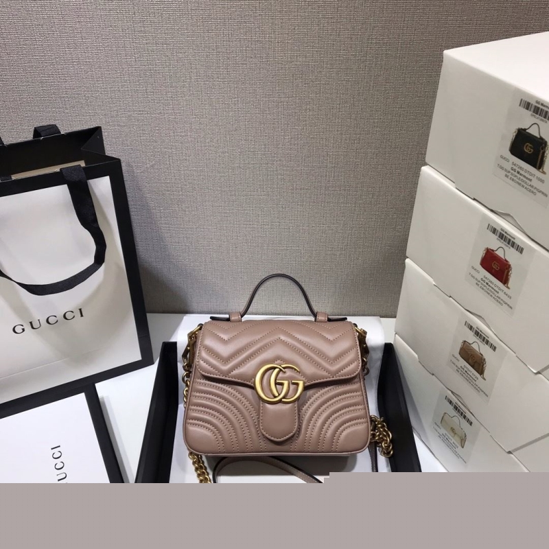G*u*i top handle bags